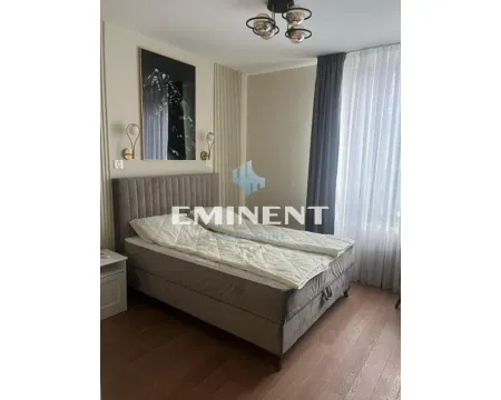 Modern bedroom with a double bed and decorative lighting. - image 5