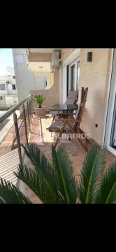 Furnished terrace with a table, chairs, and decorative plants. - image 14