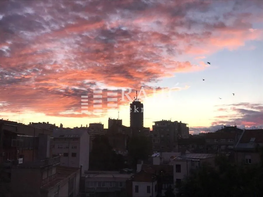 City view from the terrace at dusk.