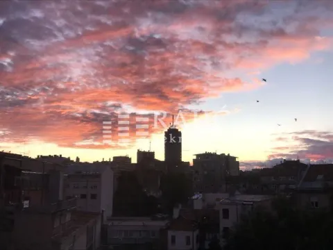 City view from the terrace at dusk. - image 10