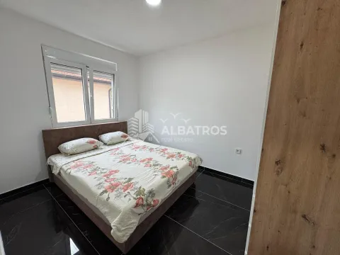 Bedroom with a double bed and a window. - image 3
