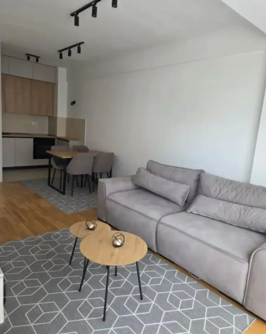 Living room connected to the dining area and kitchen.
