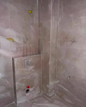 Bathroom under finishing works with installed tiles. - image 5