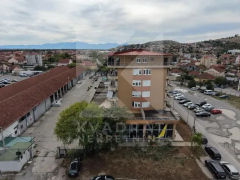 Aerial view of the residential building and the surrounding neighborhood. - image 8
