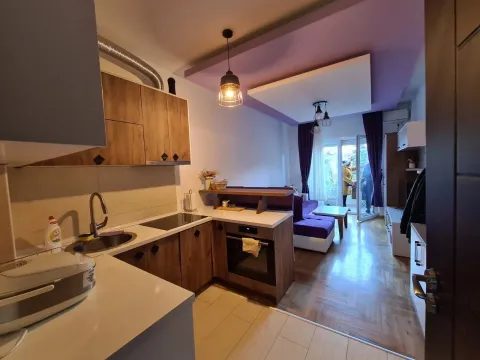 View from the kitchen towards the living room and terrace access. - image 7