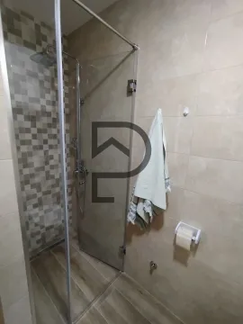 View of the bathroom with a glass walk-in shower. - image 11