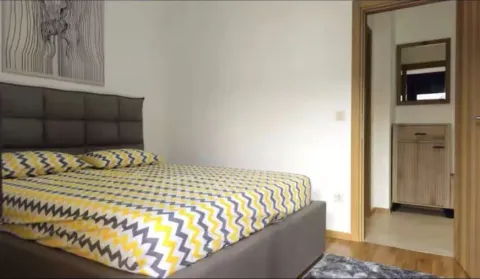Bedroom with a double bed and a view of the hallway. - image 6