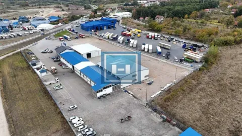 Aerial view of the business complex with warehouses and parking for freight vehicles. - image 6