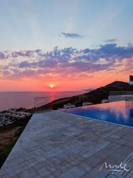 View of the sunset over the sea from the terrace and pool. - image 30