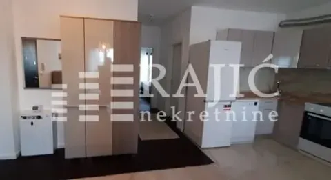 Living room with kitchen and built-in units. - image 5