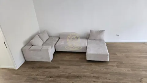 Bright living room with a modular corner sofa. - image 7