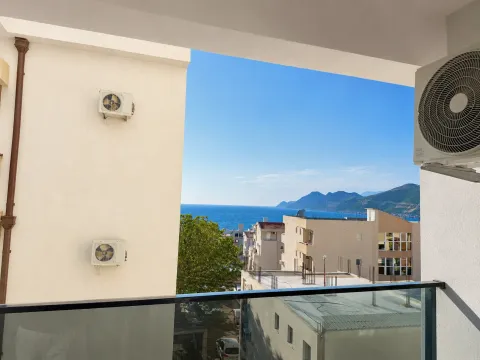 Sea view from the balcony with air conditioning units. - image 2