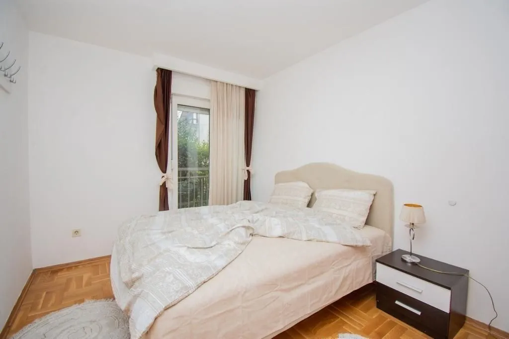 Bright bedroom with a double bed.