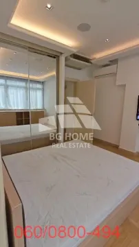 Furnished bedroom with a double bed and a mirrored built-in wardrobe. - image 9