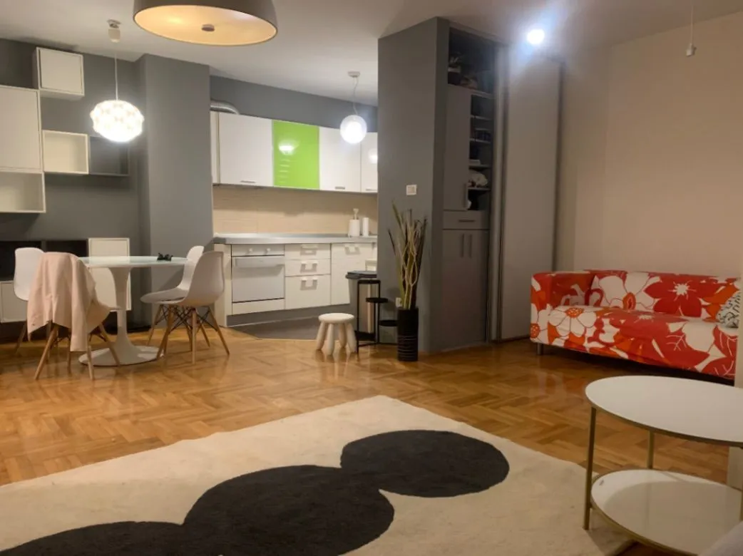 Spacious living room connected with the dining area and kitchen.