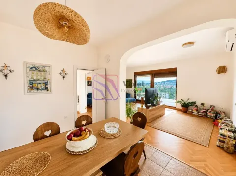 Dining area connected to the living room with access to the terrace. - image 6