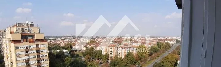View from the window of the surrounding residential buildings and the city.
