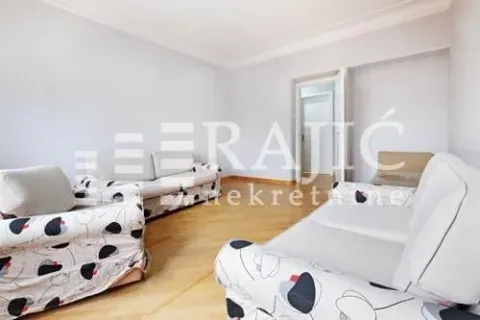 Living room with a seating set and parquet flooring. - image 2
