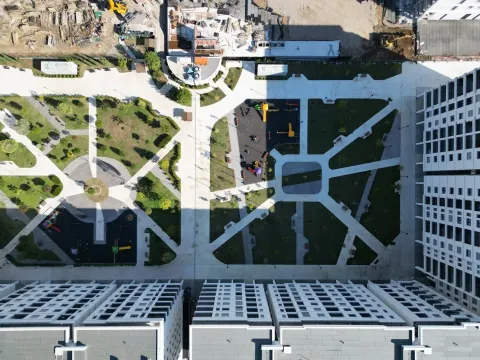 Aerial view of the courtyard and surrounding residential buildings. - image 23