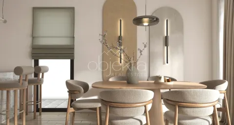 Dining area with a wooden table, chairs, and modern wall lighting. - image 7