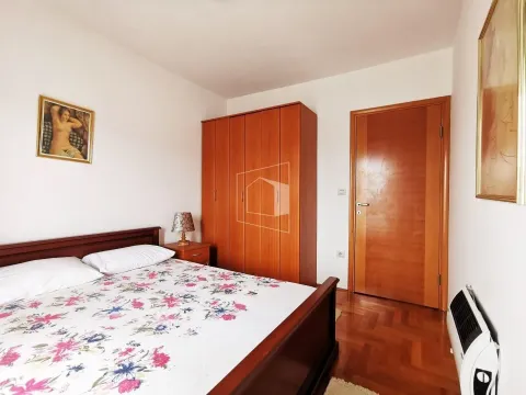 Bright bedroom with wooden furniture. - image 11