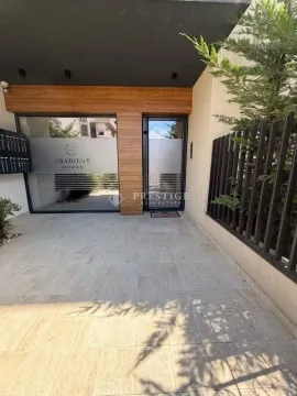 Entrance and exterior area of a residential building with a paved courtyard. - image 13