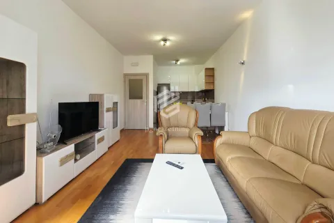 Living room with sofa set, TV unit and dining area in the background. - image 3