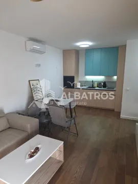 Living room with dining area and kitchen. - image 13