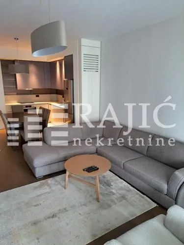 Spacious living room connected with the dining area and kitchen.