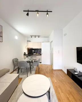Living room with dining area and open kitchen. - image 7