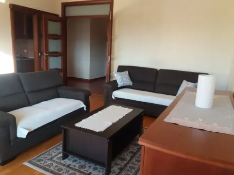 Furnished living room with seating set and dining table. - image 2