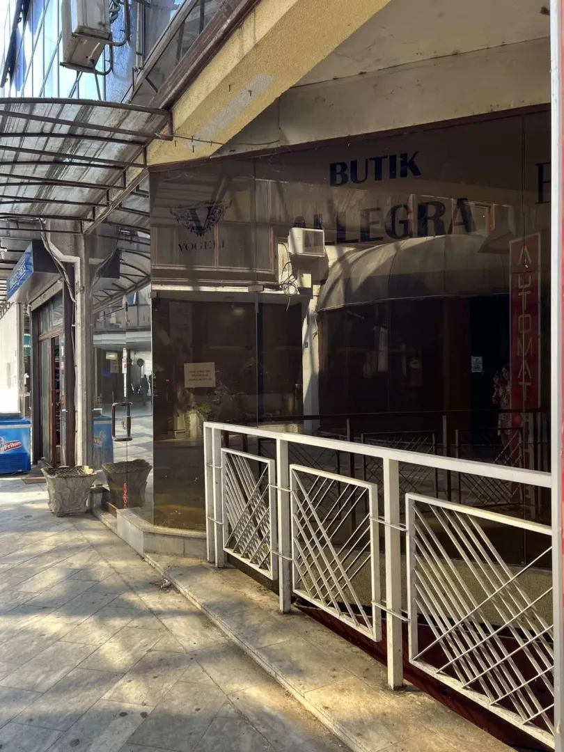 Exterior view of a commercial space with a storefront.