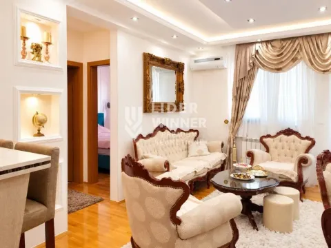 Living room with classic-style furniture and parquet flooring. - image 2