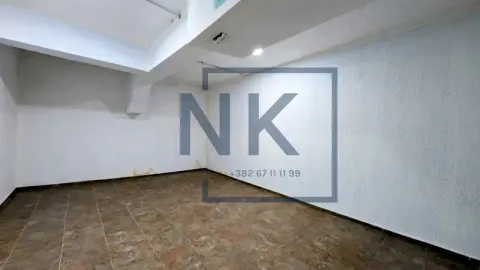 An empty room with tiled flooring and white walls. - image 7