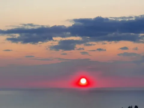 View of the sunset over the sea. - image 9