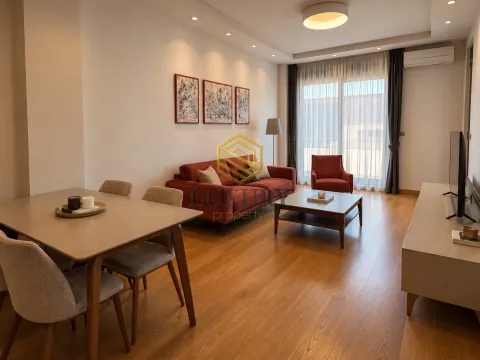 Modern living room with a sofa set, dining area, and access to the terrace. - image 5