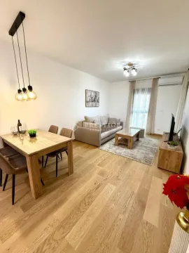 Living room with dining area and modern furniture. - image 6