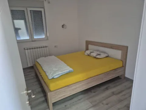 Bedroom with a double bed and a window. - image 7