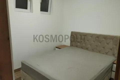 Furnished bedroom with a double bed and nightstands. - image 4