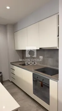 Modern kitchen with built-in units and appliances. - image 5