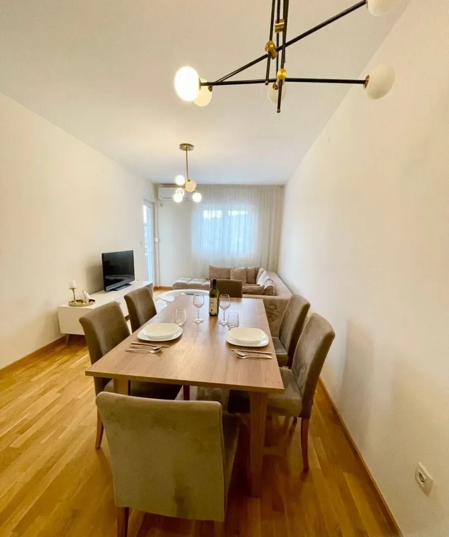 Living room with a dining table and seating set.