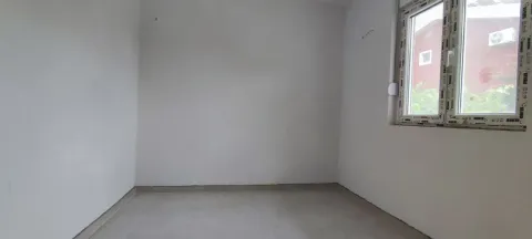 Empty unfurnished room with white walls and a window. - image 4