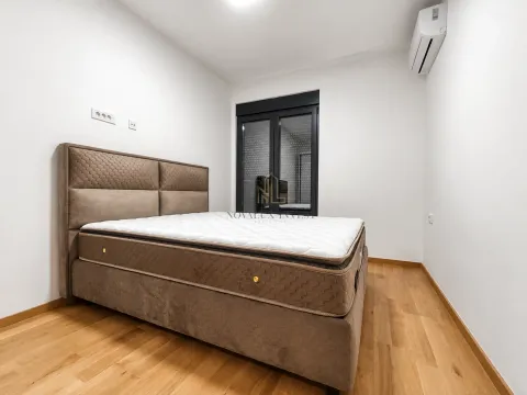 Bedroom with a double bed and air conditioning. - image 8