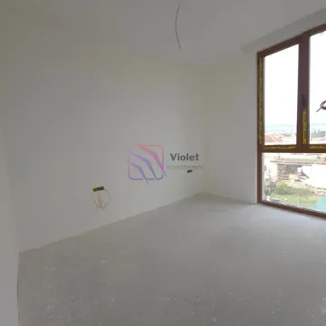 Empty unfinished room with a large window and white walls. - image 11