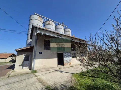 Exterior view of an industrial facility with silos. - image 4
