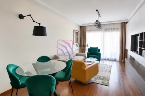 Living room with dining area and modern furniture. - image 4