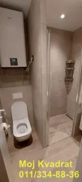 Moderno kupatilo sa tuš kabinom, wc šoljom i bojlerom. - image 7