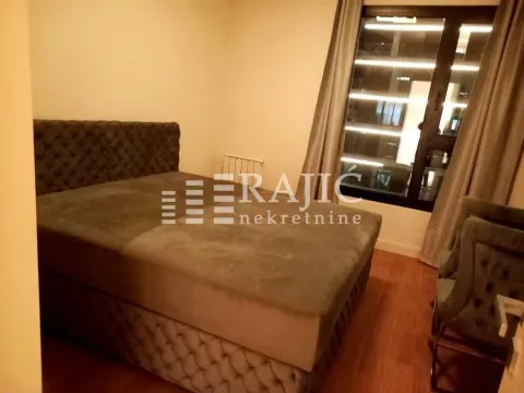 Bedroom with a double bed and a window. - image 7