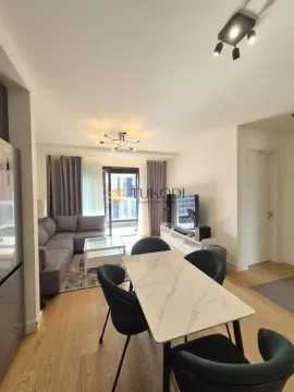 Living room with dining area and access to the terrace. - image 5