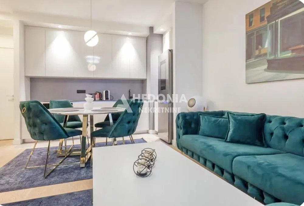 Living room with sofa set and dining area.
